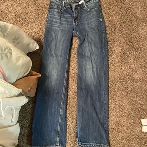 Selling three pairs of blue jeans